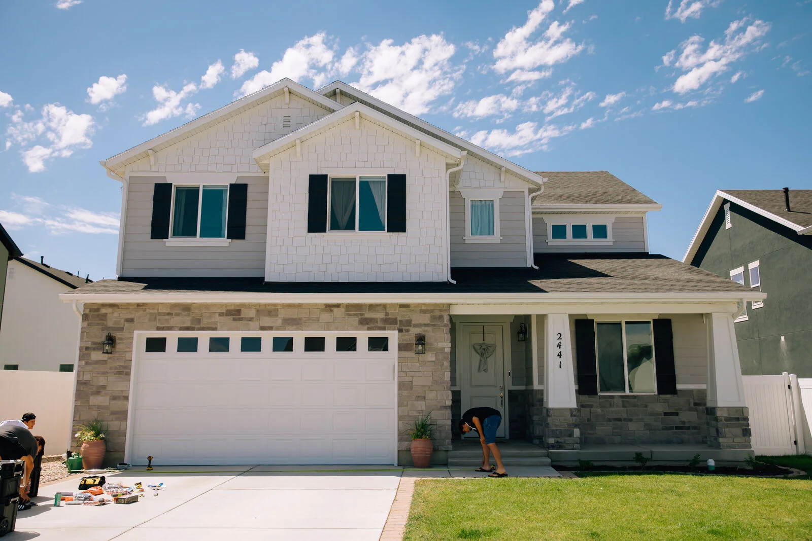 Syracuse, Utah home with CHIPR LUX permanent roofline lighting installed along the daytime roofline